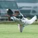 Huron's Nasheed Bass dives to make a catch during the fourth inning of the district finals against Skyline, Saturday, June 1.
Courtney Sacco I AnnArbor.com 